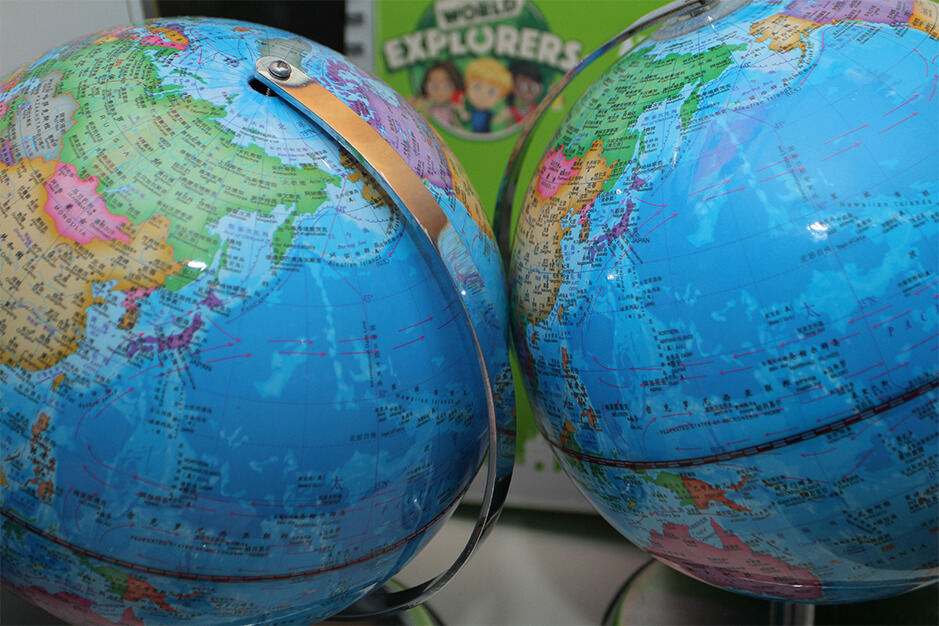 two spinning world globe