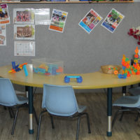 kinder room play table and bulletin wall