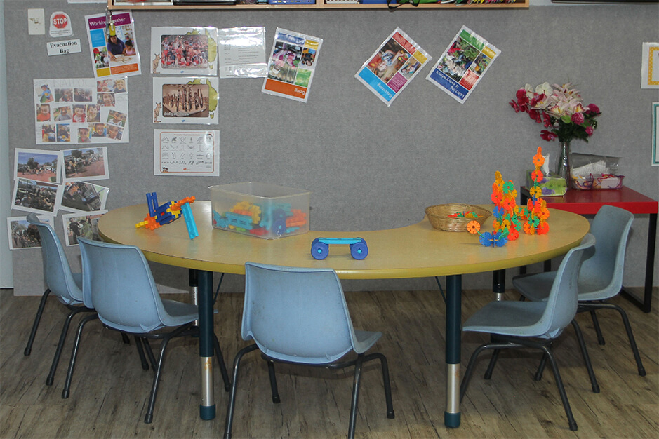 kinder room play table and bulletin wall
